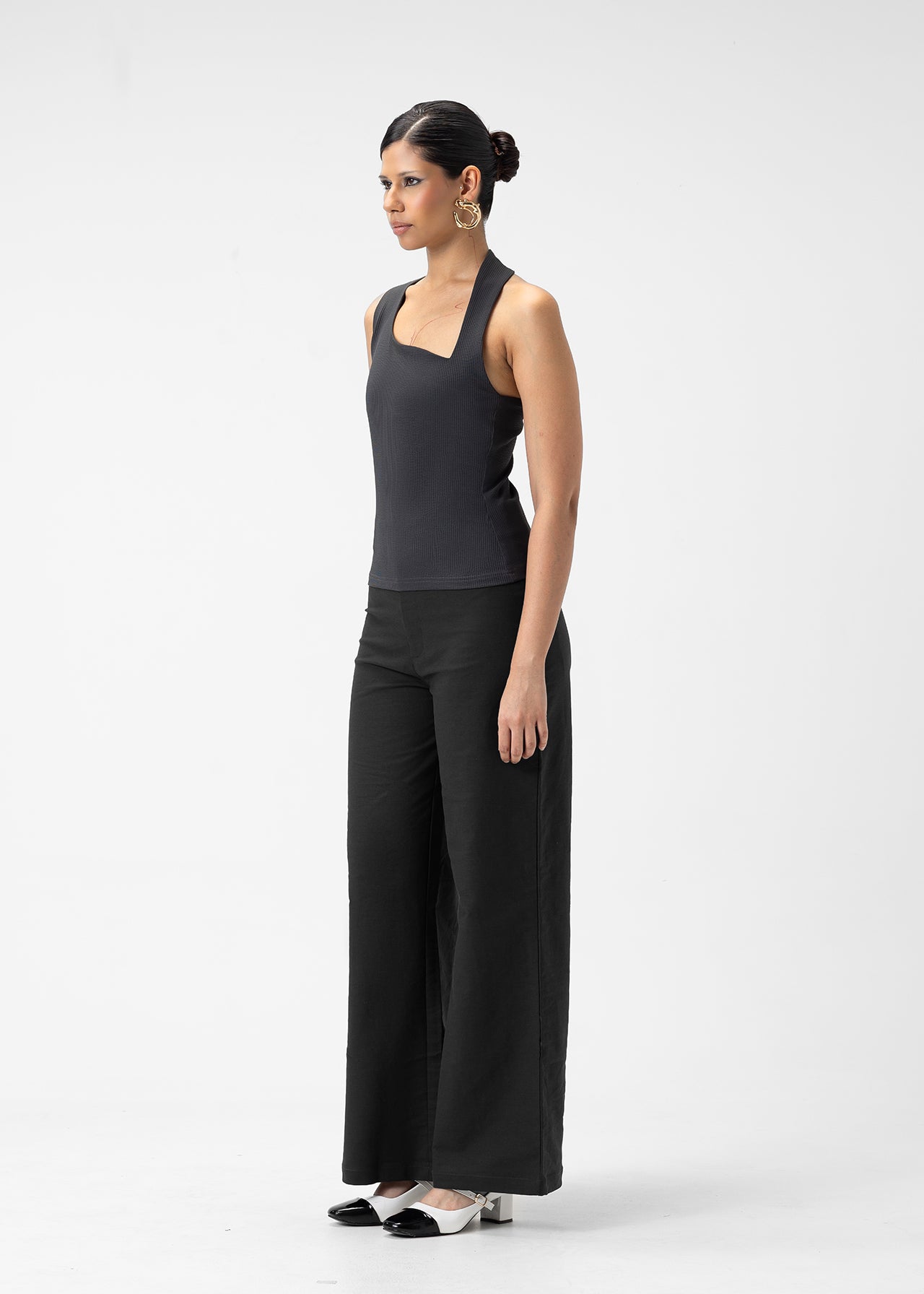 ASYMMETRIC STRUCTURED TOP