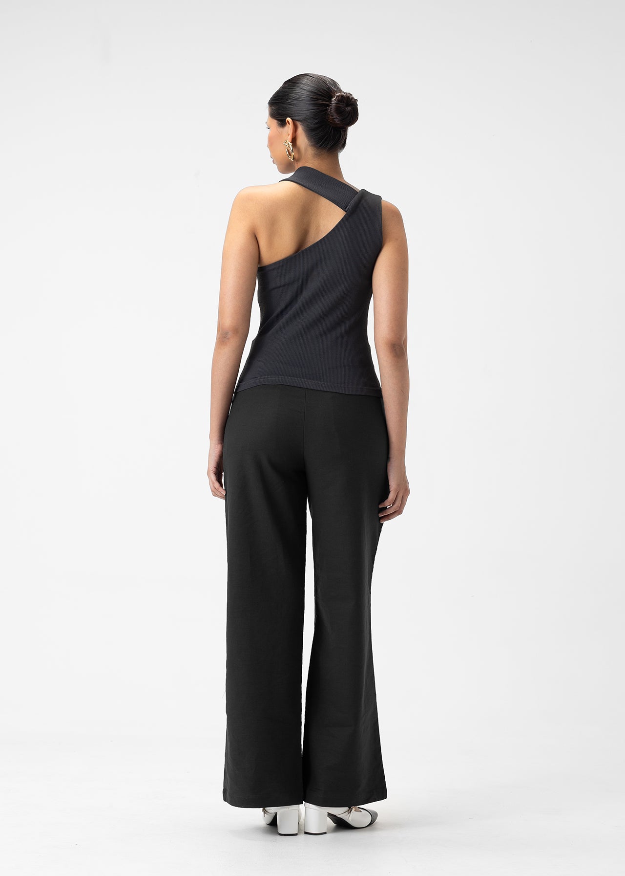 ASYMMETRIC STRUCTURED TOP