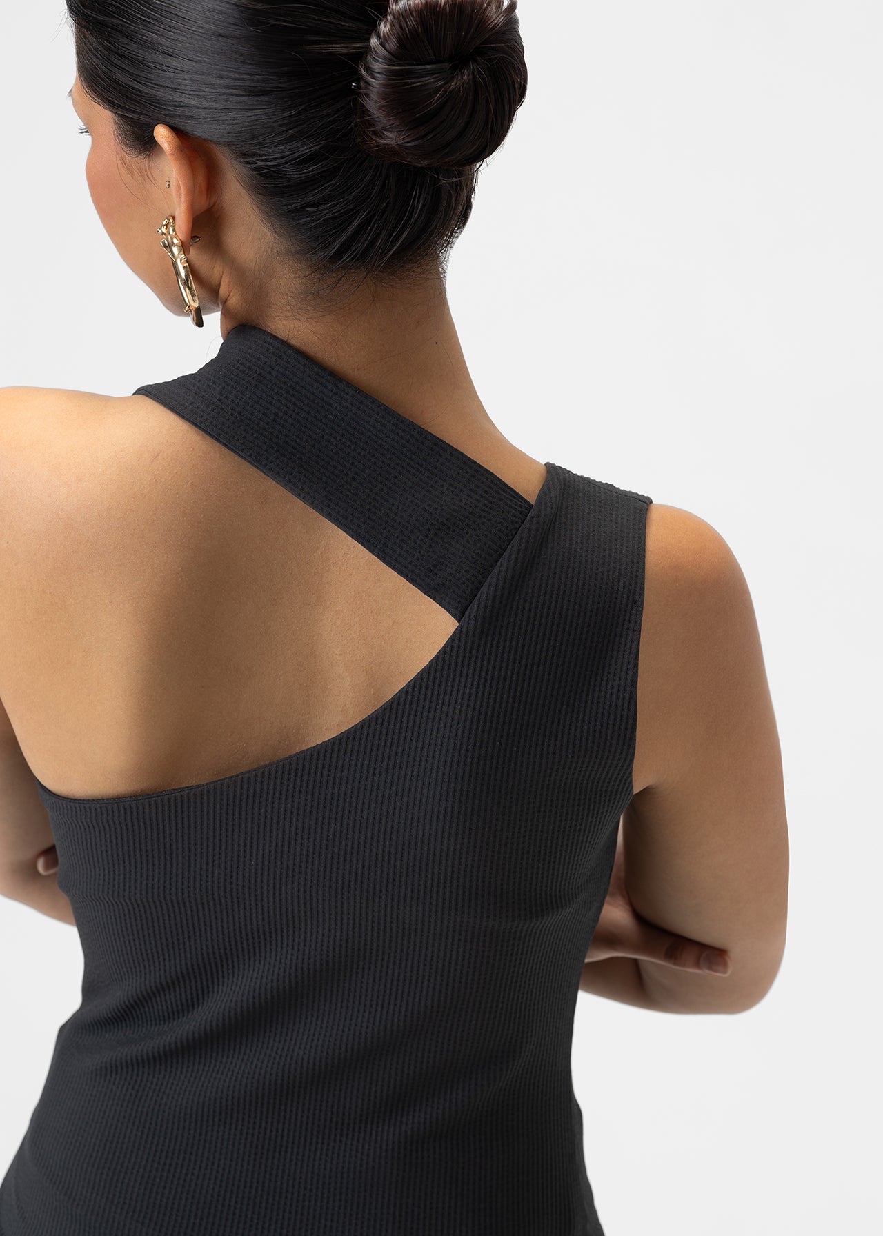 ASYMMETRIC STRUCTURED TOP