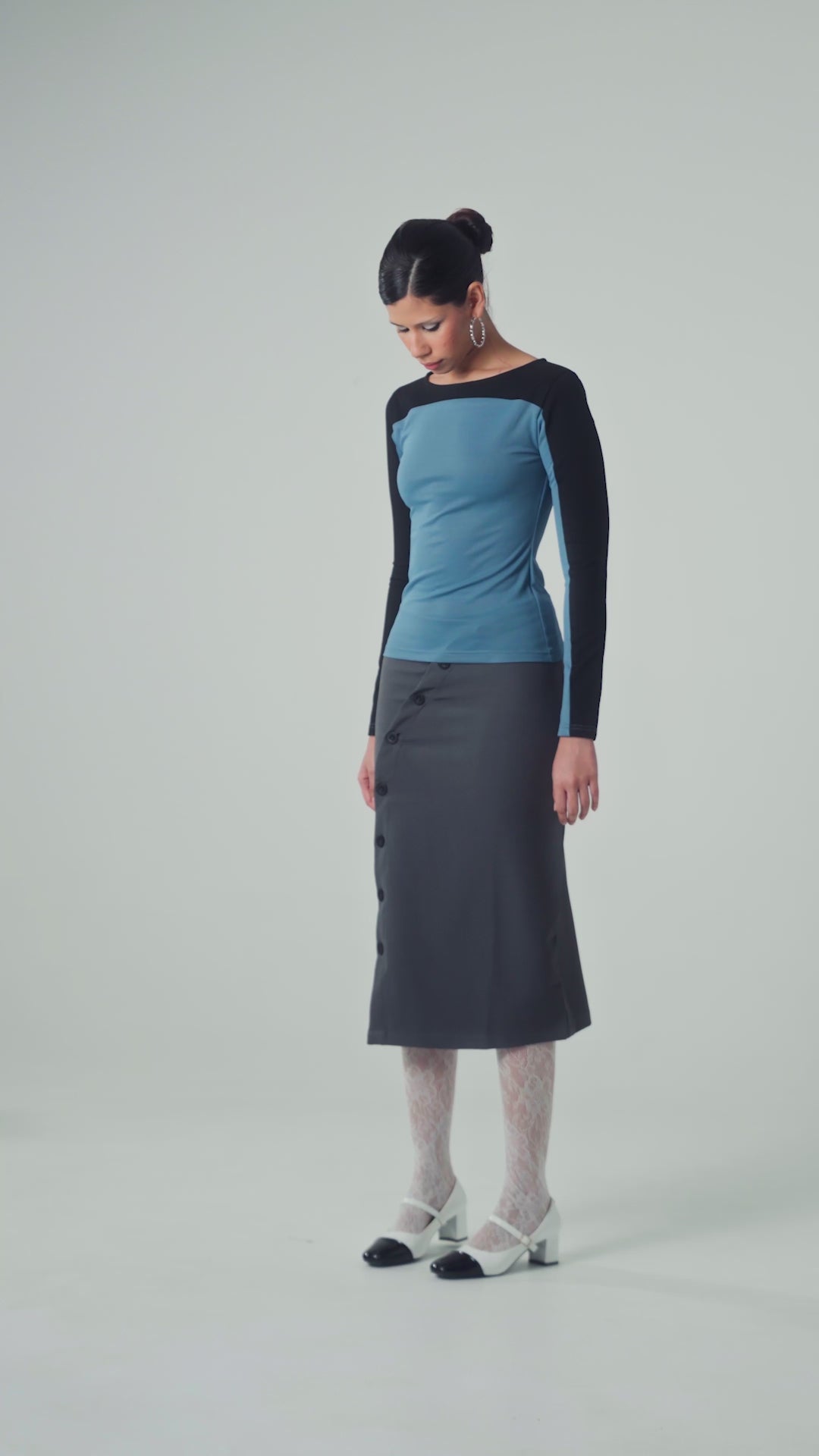 ASYMMETRIC BUTTON MIDI SKIRT
